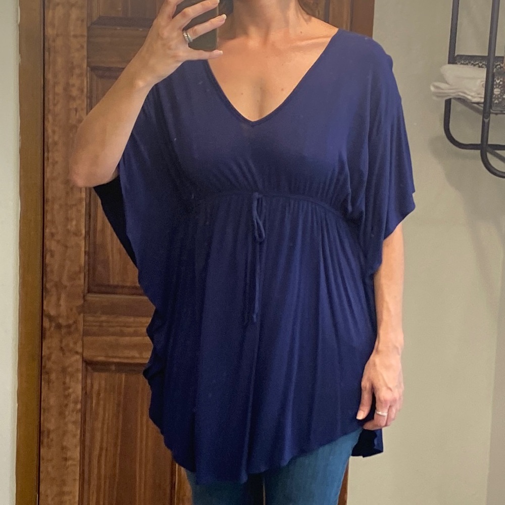 Woman’s navy blue empire waste blouse never worn